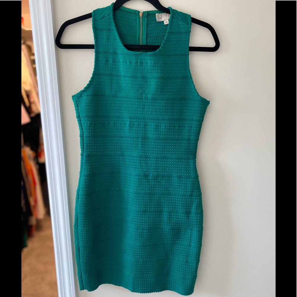 Green mini bodycon dress with T back